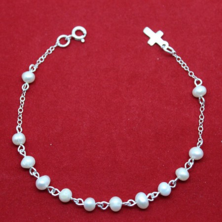 /products/pulsera-de-plata-de-ley-con-perlas-formando-un-rosario/